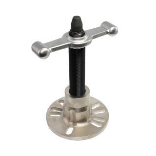 Brida de extracción con husillo de impacto